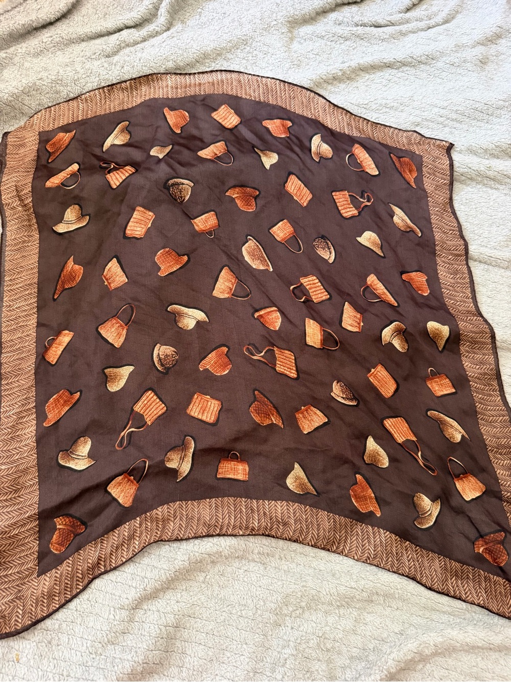 Brown Decorative Throw with Orange Hat & Bag Motif